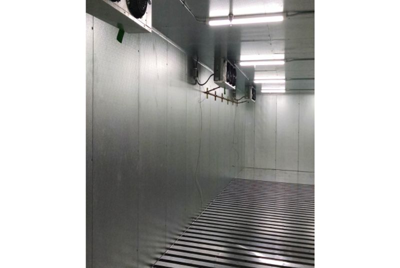 interior of walk-in cooler with evaporators