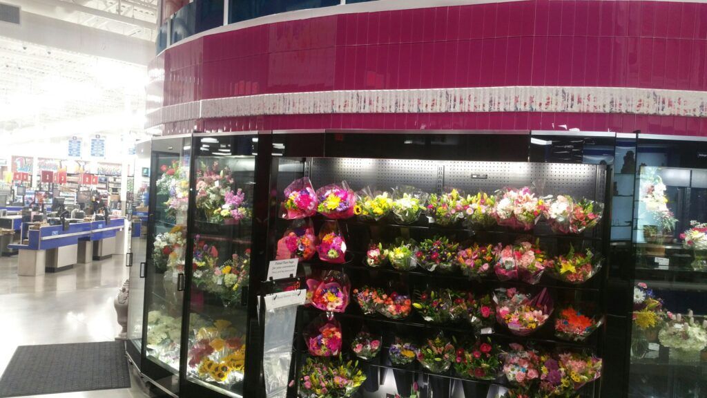 Floral cooler showcasing a variety of flower bouquet options