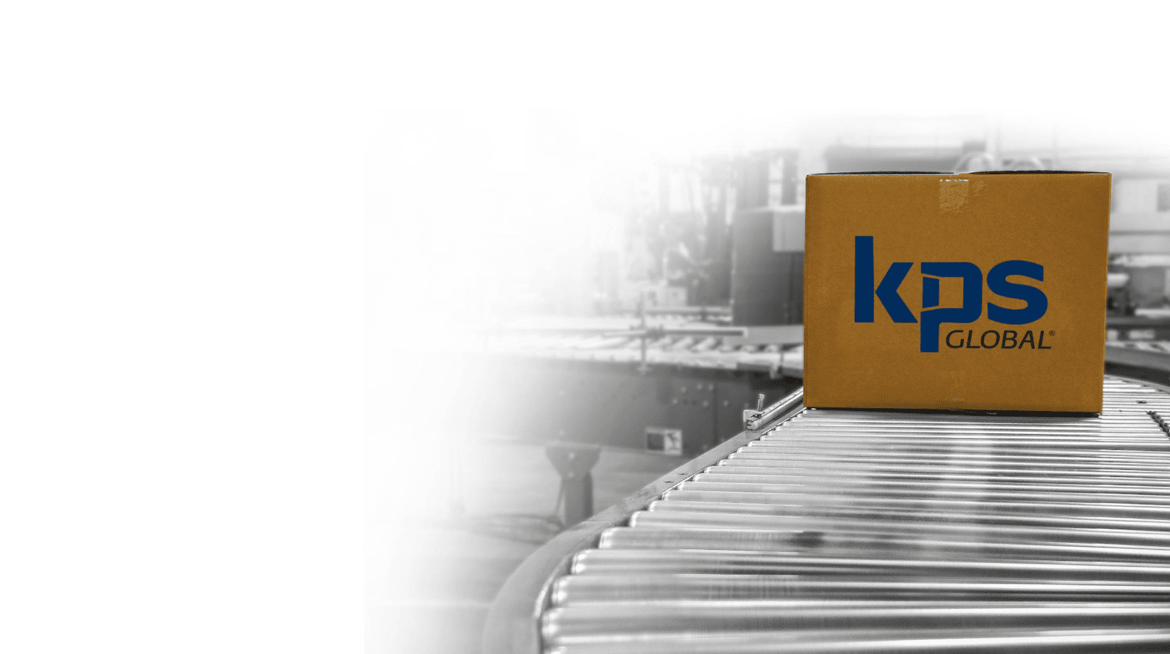 cardboard box rolls down manufacturing facility conveyer belt of walk-in supplier