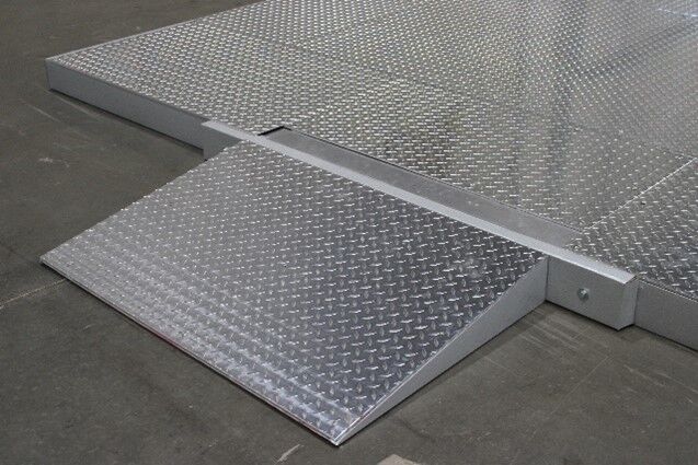 exterior ramp built onto walk-in floor to allow easy access into and out of cooler or freezer