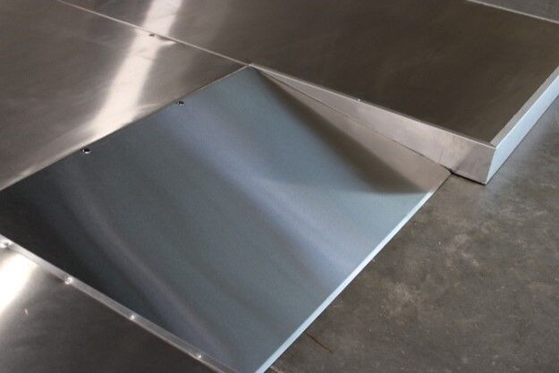 metal ramp built into walk-in floor panel
